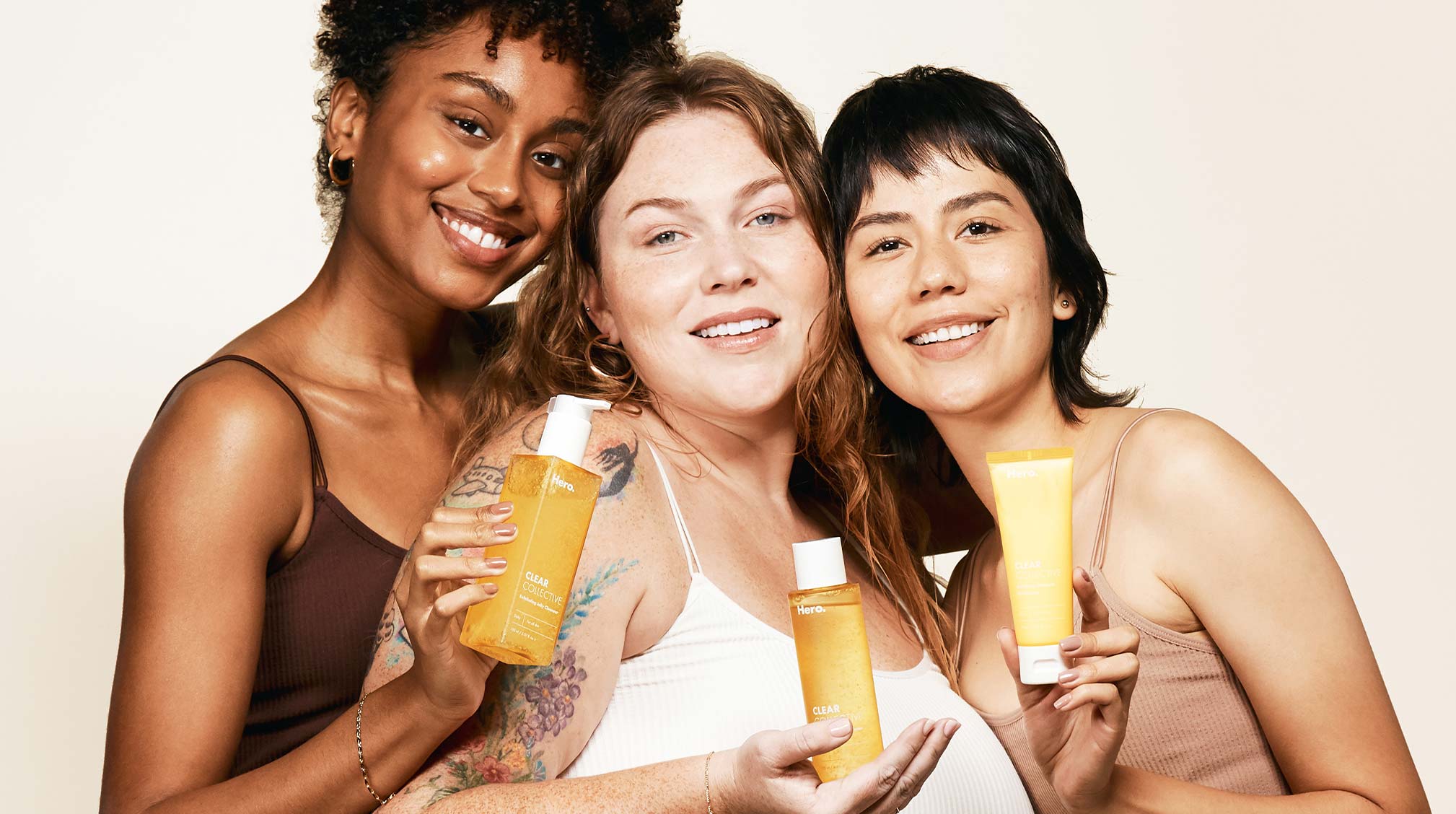 Models holding Clear Collective trio