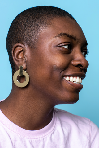 African American girl with Mighty Patch on cheek